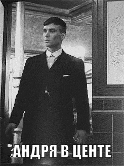 a black and white photo of a man in a suit with a caption in a foreign language ..