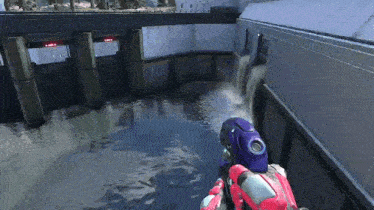 a video game scene with a waterfall and a person holding a gun