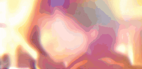 a purple and orange background with a blurred image of a person 's face