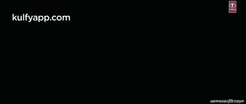 a silhouette of a man and a woman dancing with the website kulfyapp.com in the background