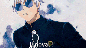 a man wearing sunglasses and a necklace that says junoval !!
