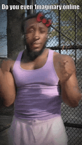 a man wearing a purple tank top with a hello kitty bow on his head