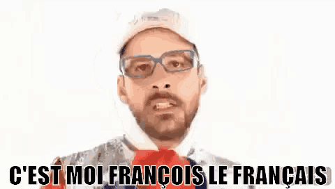 a man with a beard and glasses is wearing a red , white , and blue outfit .