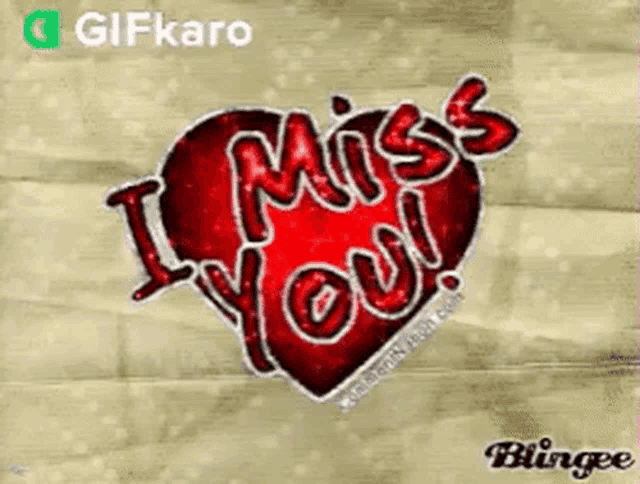a red heart with the words `` i miss you '' on it
