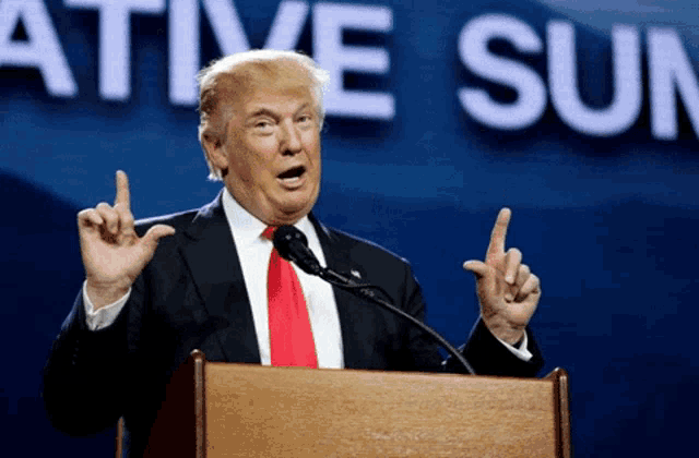 donald trump giving a speech in front of a sign that says " native sun "