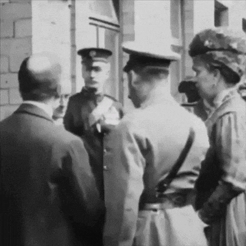 a black and white photo of a group of soldiers