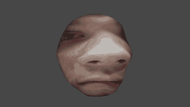 a close up of a person 's face on a grey background