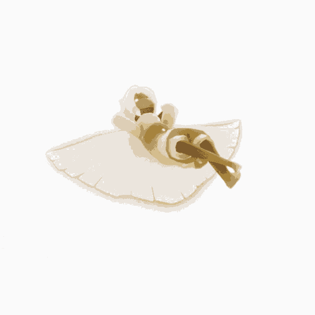 a cartoon character with white wings and a gold sword
