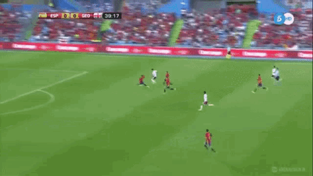 a soccer game is being played in a stadium with ads for movistar and iberdrola