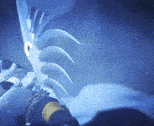 a person is holding a sword in a dark room with a blue background .