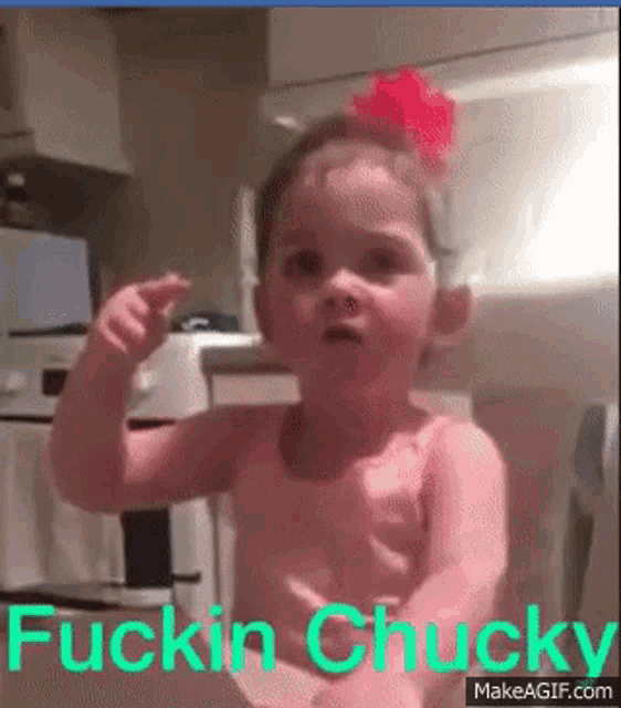 a little girl in a pink tank top with the words fuckin chucky