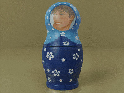 a blue green and orange nesting doll with a picture of a man on the head