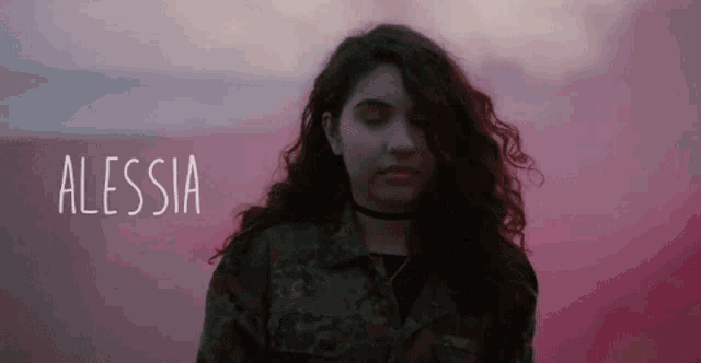 a woman with a choker and the name alessia on the bottom