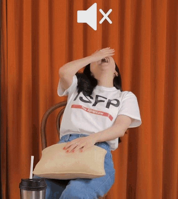 a woman wearing a t-shirt that says sfp the adventurer