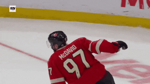 a hockey player with the name mcdavid and the number 97