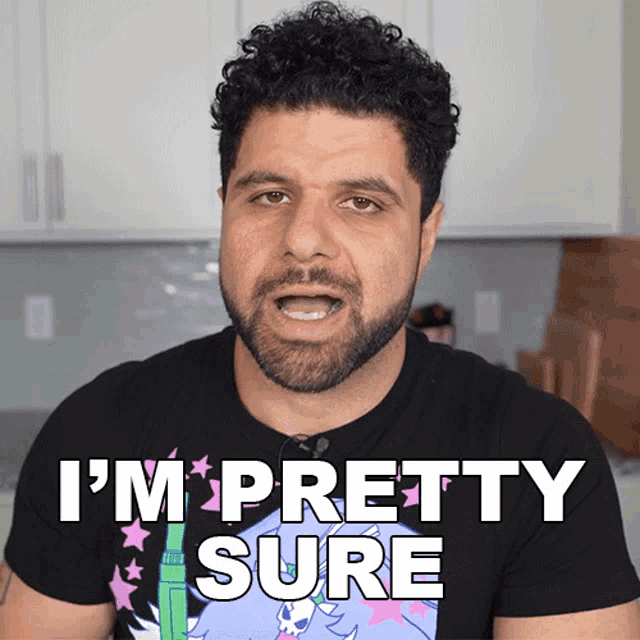 a man with a beard wears a black shirt that says i 'm pretty sure