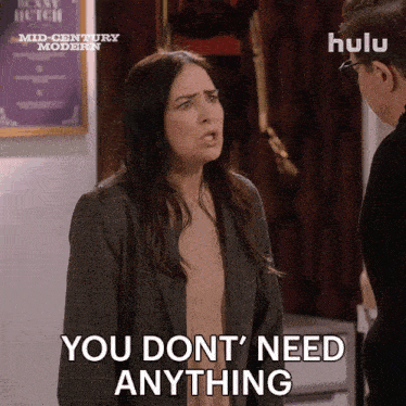a woman says " you don 't need anything " in front of a man