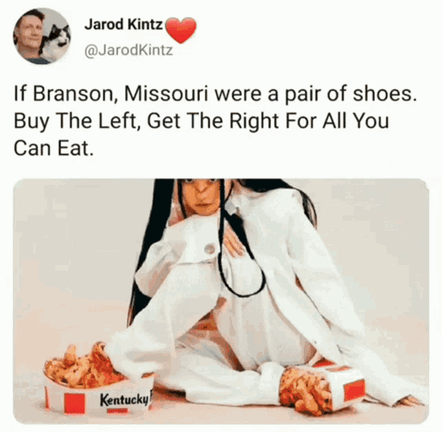 a tweet from jarod kintz shows a woman sitting on the floor with a box of kentucky fried chicken