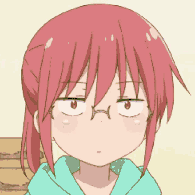 a girl with red hair is wearing glasses and a blue shirt