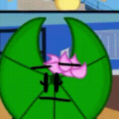 a green cartoon character with a pink flower on its head
