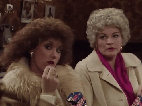 two women are standing next to each other with the word drama on the bottom