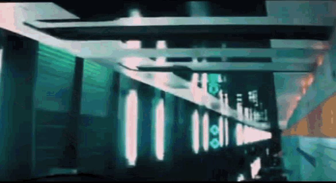 a train is going down the tracks in a subway station