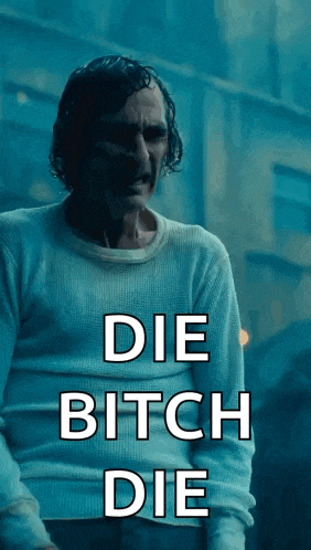 a man in a white sweater with the words " die bitch die " on it