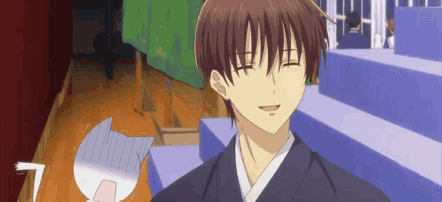 a man in a kimono with his eyes closed