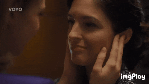 two women hugging each other with the words imgplay in the corner