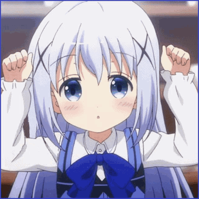 a girl with white hair and blue eyes is wearing a blue bow tie