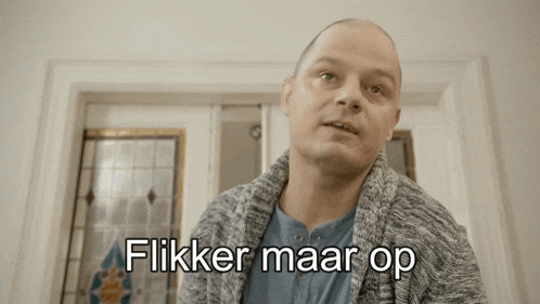 a man wearing a grey sweater says " flicker maar op "