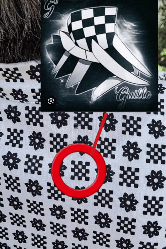 a black and white checkered shirt with the name guille on the back