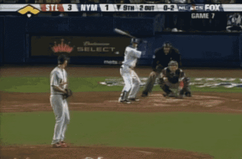a baseball game is being played with a fox advertisement in the background