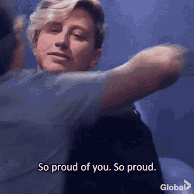 a man is hugging another man and saying so proud of you