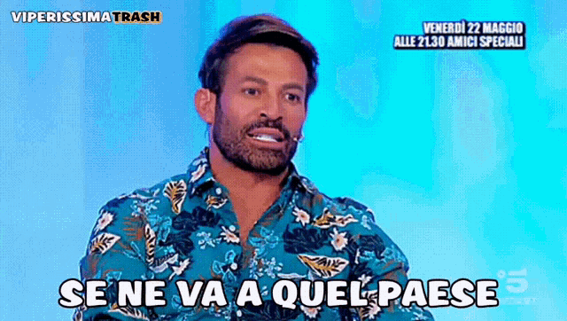 a man in a blue shirt says se ne va a quell paese