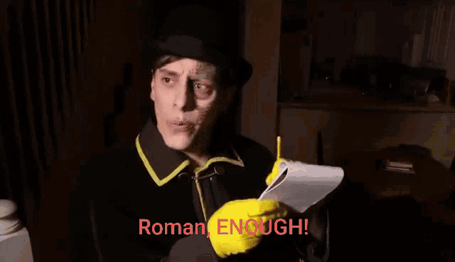 a man wearing a top hat and yellow gloves is holding a piece of paper and a pen .