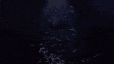 a person is floating in the water with bubbles coming out of the water