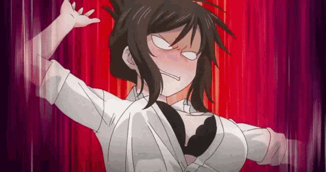 a girl in a white shirt and black bra is making a face .
