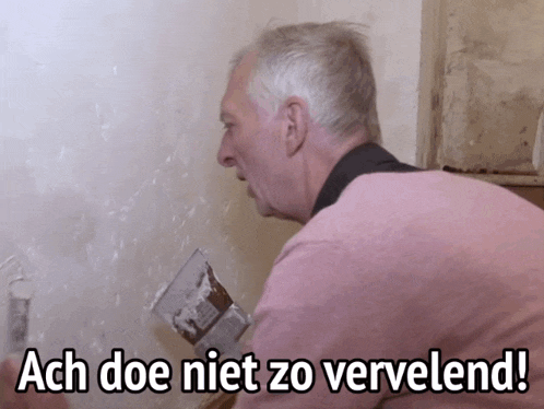 a man is working on a wall and says ach doe niet zo vervelend !