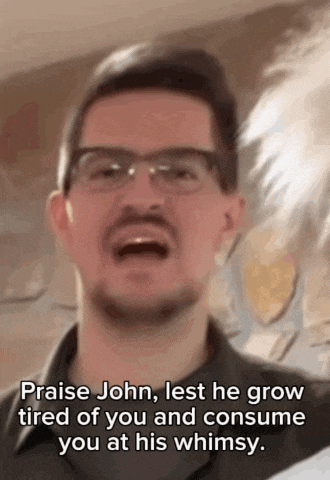 a man with glasses and a beard is singing praise john lest he grow tired of you and consume you at his whims