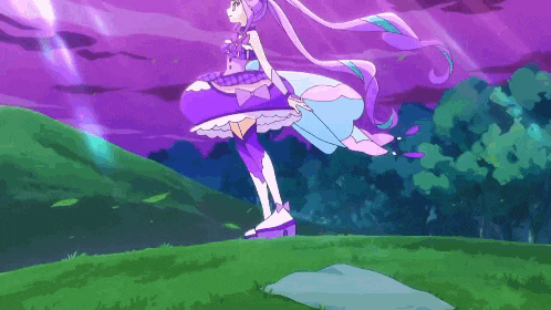 a girl in a purple and blue dress is standing on a grassy hill .