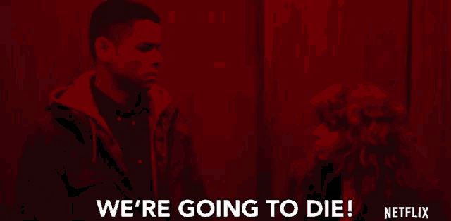 a netflix ad shows a man and a woman in a dark room and says we 're going to die