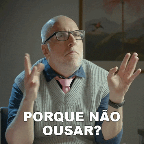 a bald man wearing glasses and a pink tie says porque não ousar