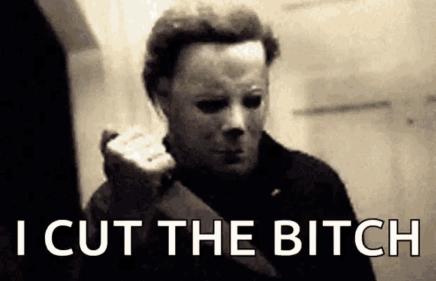a man in a mask is holding a knife in his hand and says `` i cut the bitch '' .