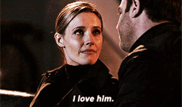 a woman says i love him while looking at a man