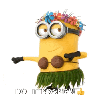 a minion is wearing a hula skirt and a flower crown and giving a thumbs up .