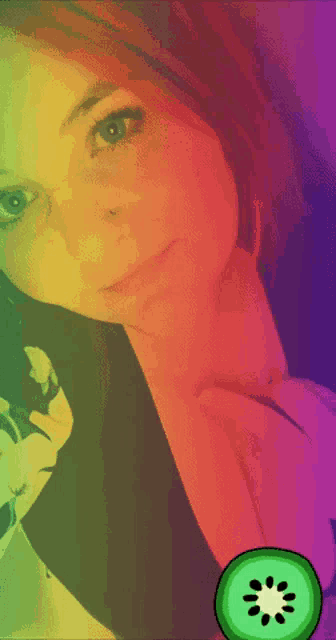 a woman taking a selfie with a rainbow background