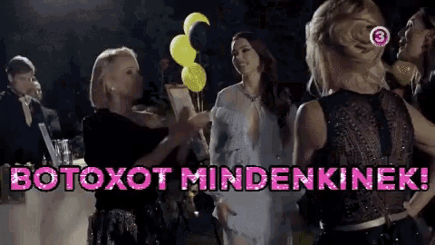 a group of women are dancing with botoxot mindenkinek written in pink