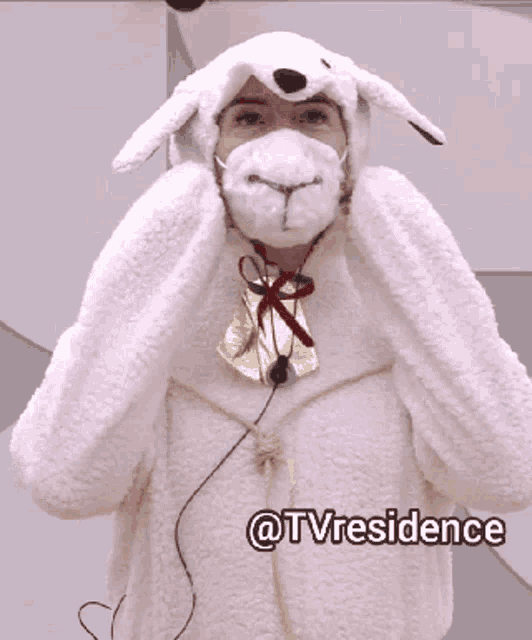 a man dressed in a sheep costume with the words @tvresidence above him