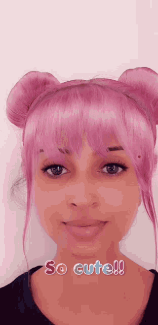 a girl with pink hair has the words so cute written on her face